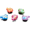 Ozdoby Jibbitz™ Tiny Axolotls, balení po 5 kusech
